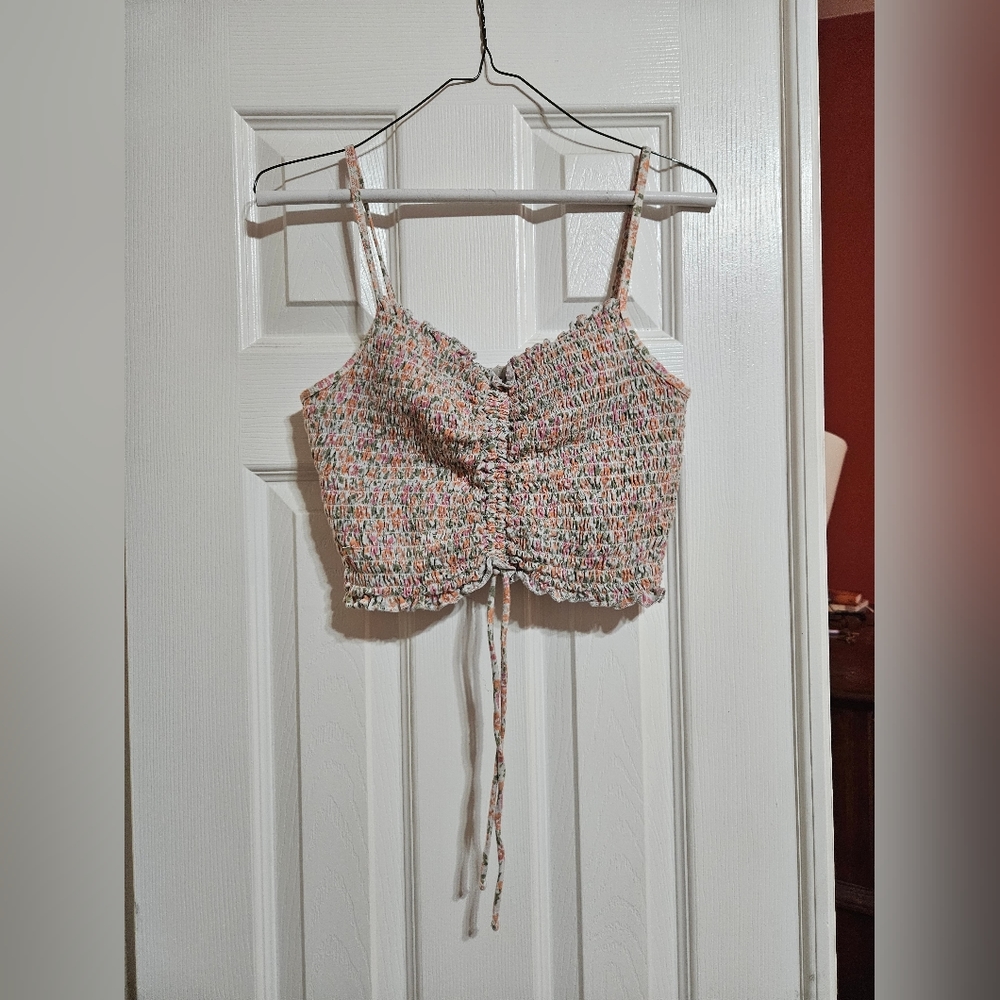 Floral crop top with spaghetti straps and adjustable ruching